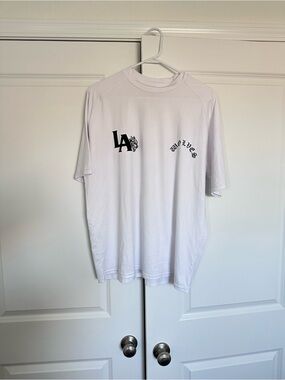 Darc Sport White Short-Sleeve Tee with Black LA Wolves Graphics